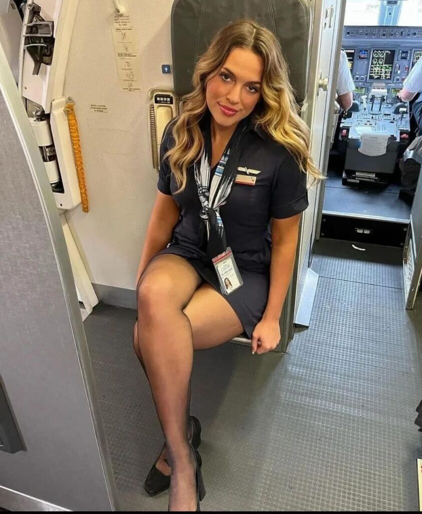 sexy blonde flight attendent short skirt sexy long legs